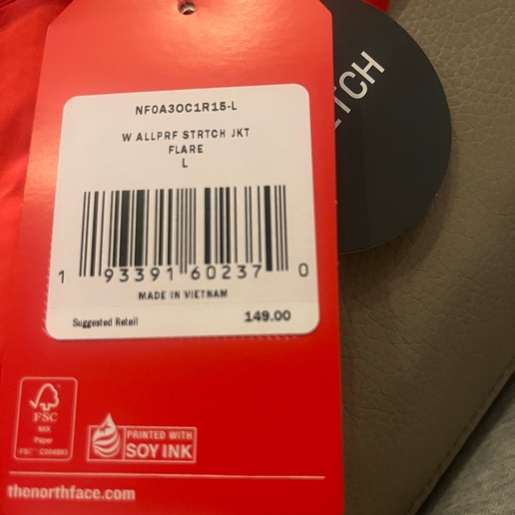 A orange north face jacket - Picture 4 of 4